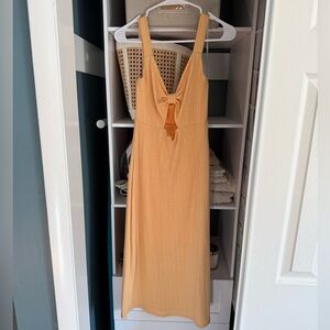 Yellow midi dress with cut out